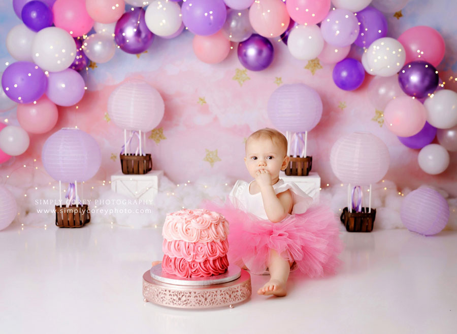 cake smash photographer near Peachtree City, pink and purple hot air balloon studio theme