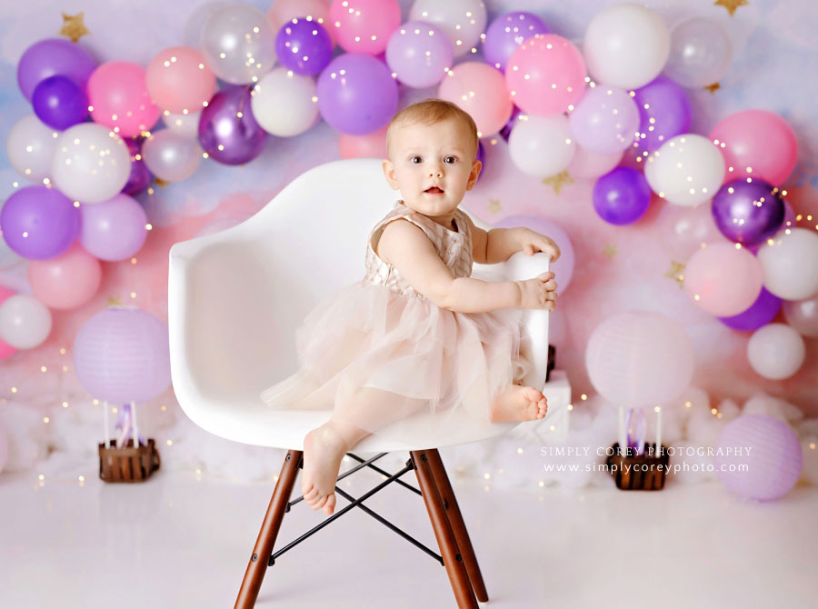 Villa Rica baby photographer, girl in white chair during milestone session