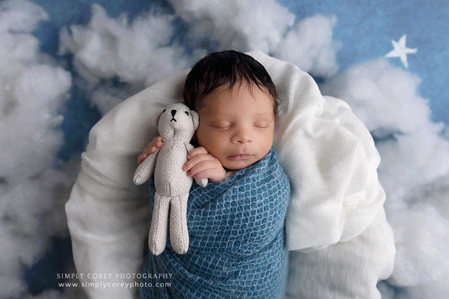 Newnan newborn photographer, baby boy in blue with teddy bear
