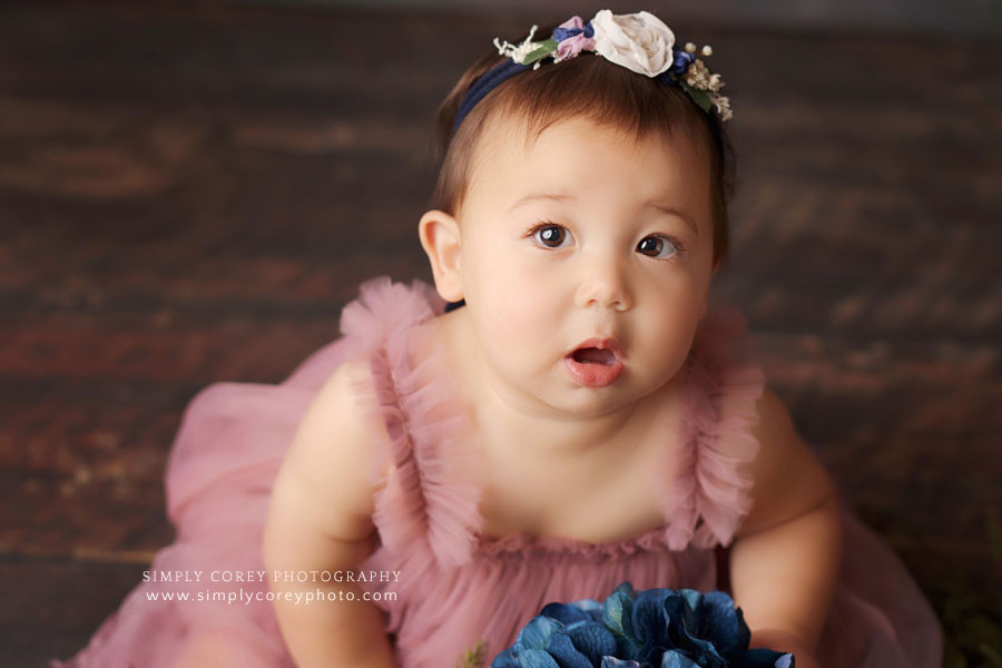 baby photographer near Dallas, GA; girl in pink tulle dress with flowers