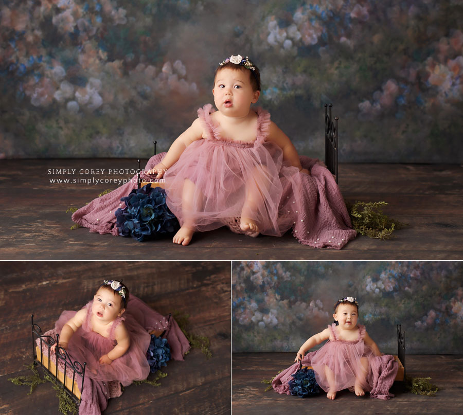 Carrollton baby photographer in Georgia, girl sitter session with floral studio backdrop