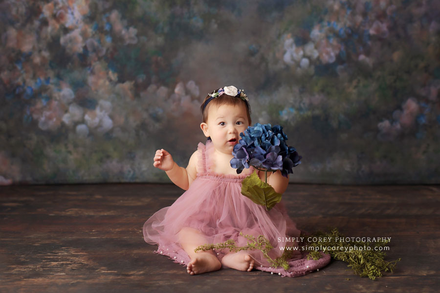 Villa Rica baby photographer, girl in tulle dress with hydrangea and floral backdrop