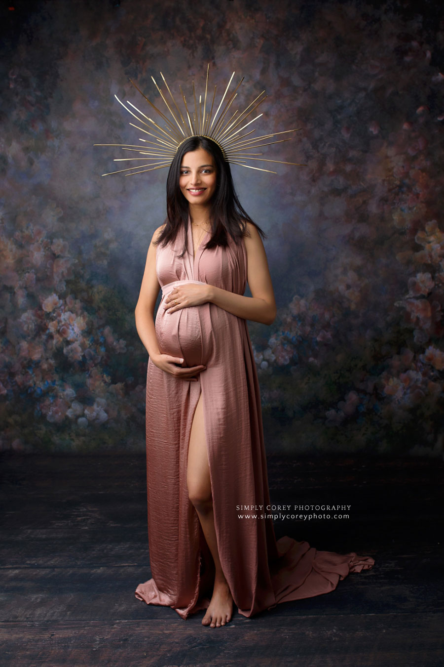Douglasville maternity photographer, studio portrait with pink dress and gold crown