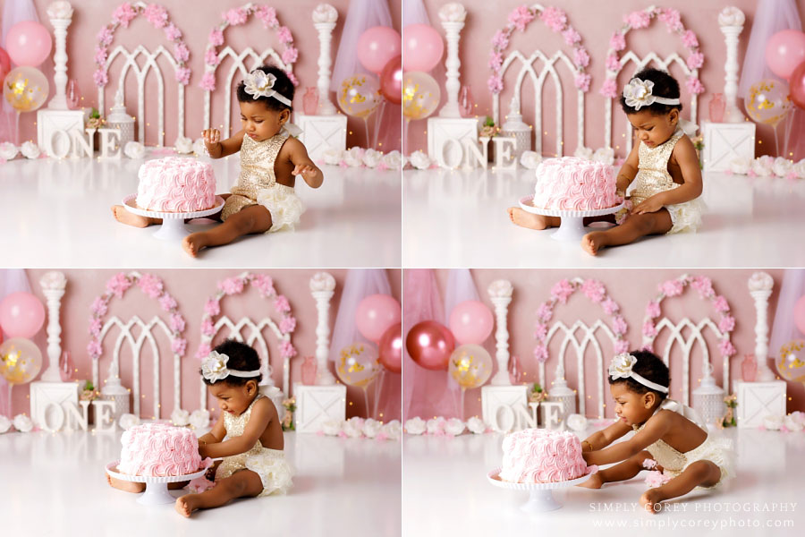 cake smash photographer near Dallas, GA; baby girl pushing pink cake away