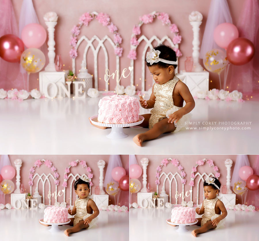 Douglasville cake smash photographer, baby in gold romper with pink princess set