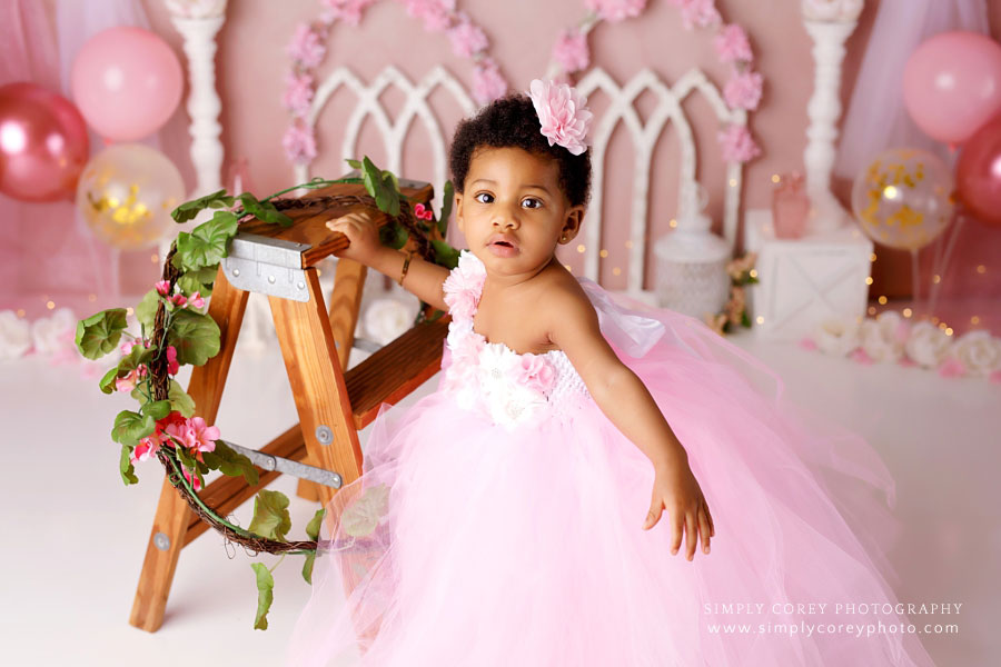 Villa Rica baby photographer, girl in tulle dress with small ladder and flowers