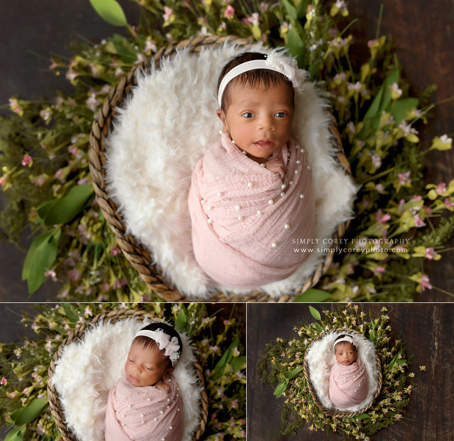 Douglasville newborn photographer, baby girl in pink wrap with flowers