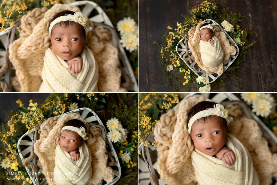 Hiram newborn photographer, baby girl with rustic yellow studio set
