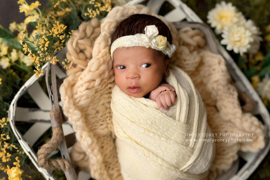newborn photographer near Atlanta, baby girl with rustic yellow set for spring
