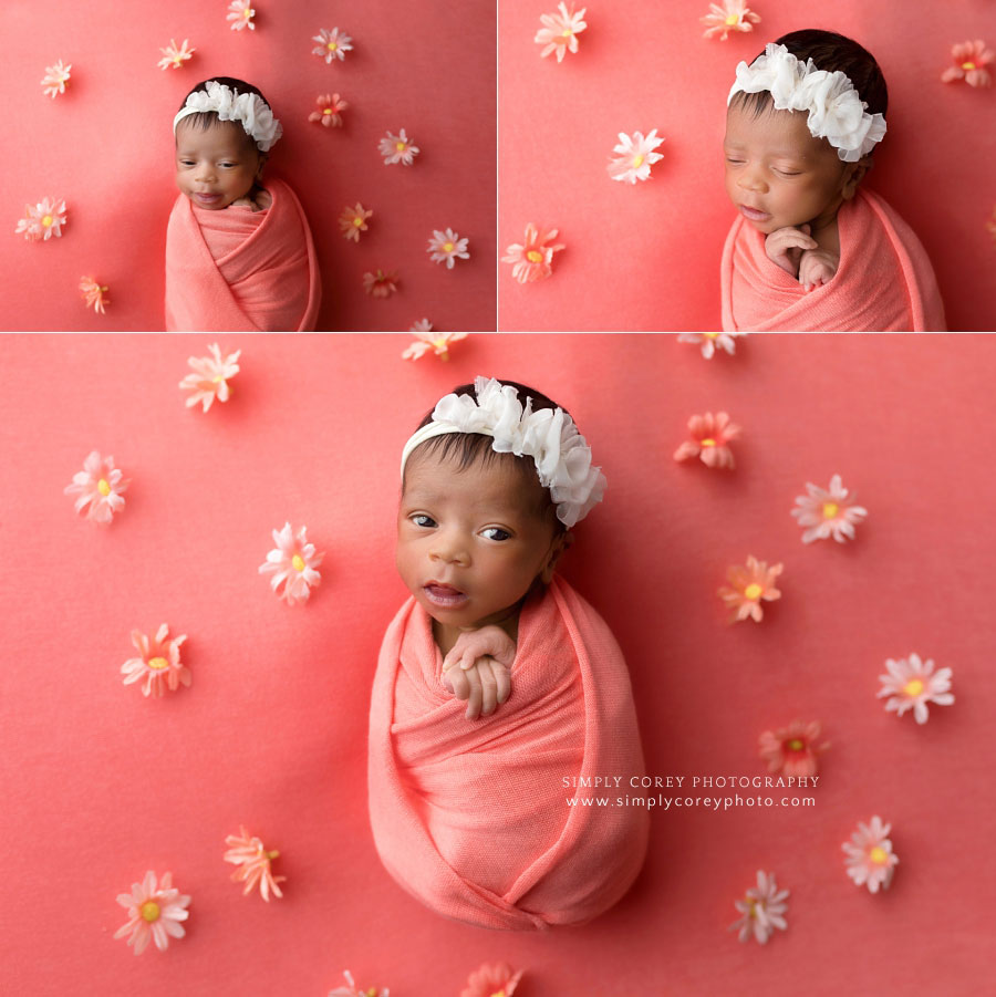 newborn photographer near Peachtree City, baby girl on coral studio backdrop