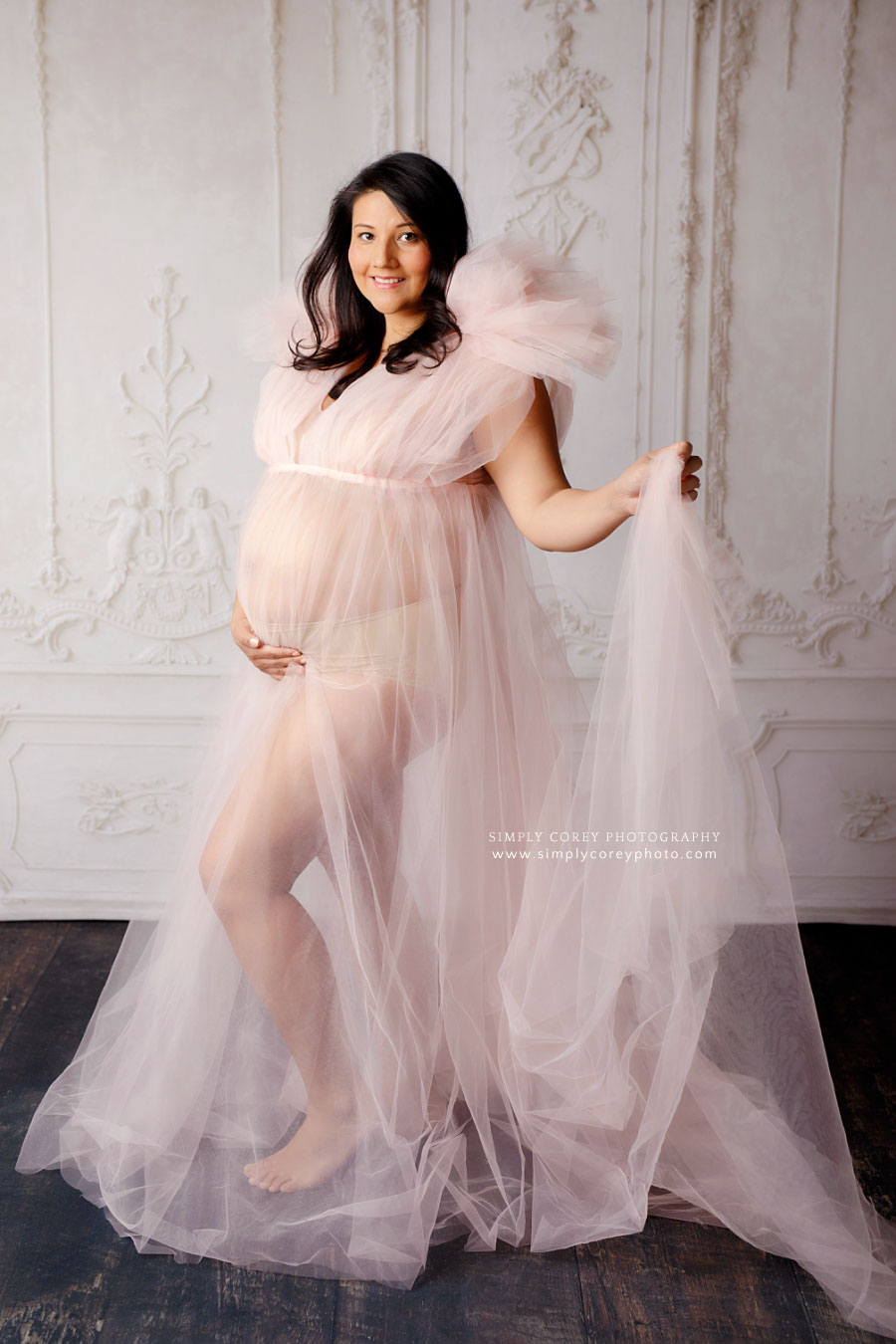 Newnan maternity photographer, studio pregnancy portrait in pink tulle dress