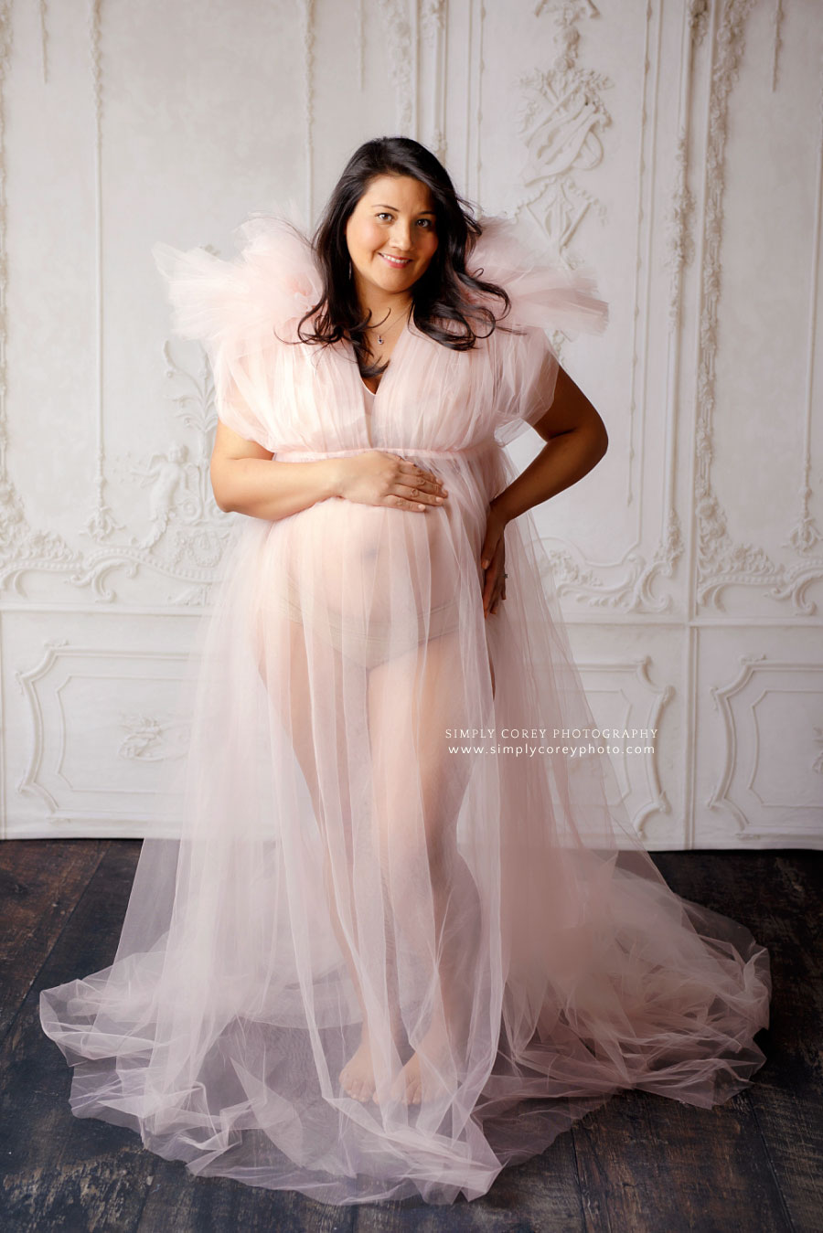 Peachtree City maternity photographer, studio maternity portrait in pink tulle dress