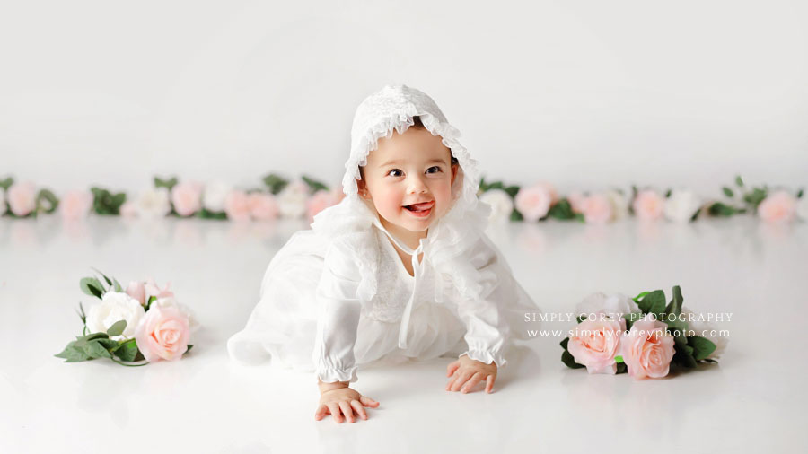 Newnan baby photographer, girl in white dress and hat before cake smash session