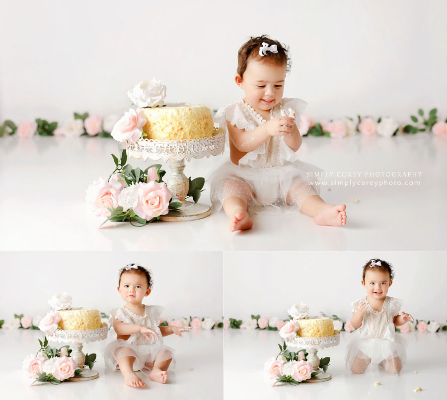 Peachtree City cake smash photographer, baby girl playing with cake in studio