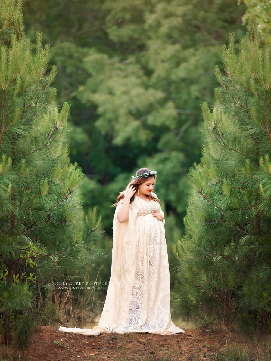 Newnan maternity photographer, outdoor portrait with lace boho dress and pine trees