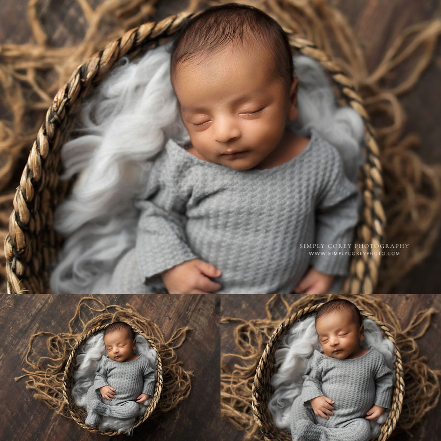 newborn photographer near Newnan, baby boy in gray sleeper in basket