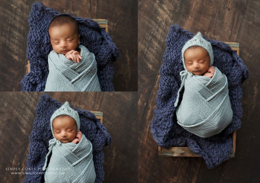 Villa Rica newborn photographer, baby boy in blue swaddle wrap and hat