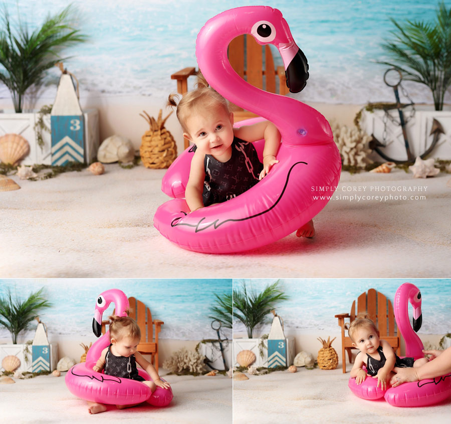 baby photographer near Dallas, Georgia; beach studio session with flamingo pool float and Louis Vuitton bathing suit