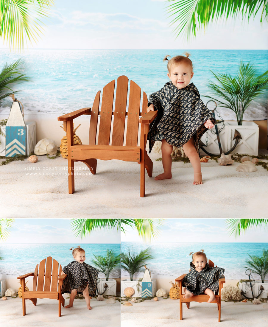 baby photographer near Lithia Springs, beach studio milestone session with Dior poncho