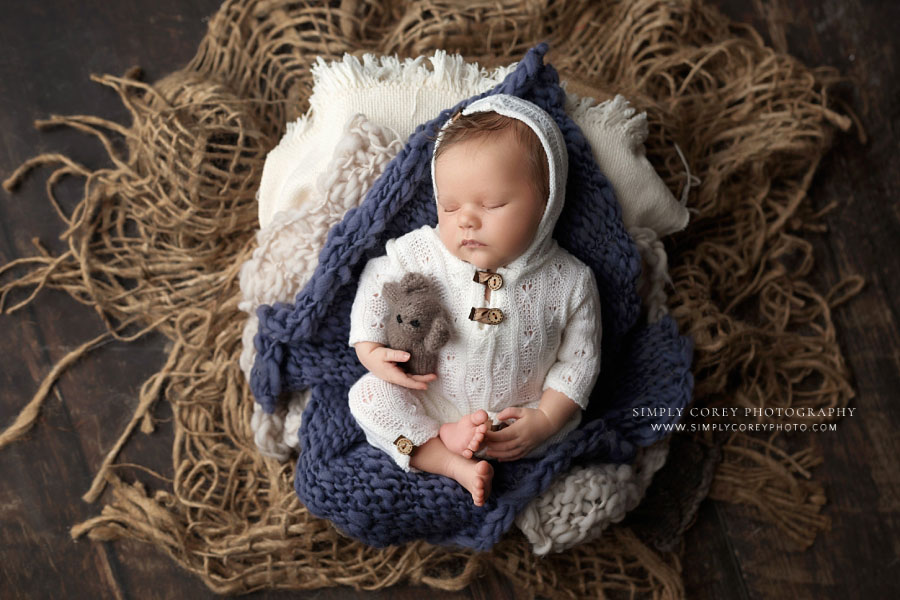 Douglasville newborn photographer, baby boy in hooded knit sleeper with bear