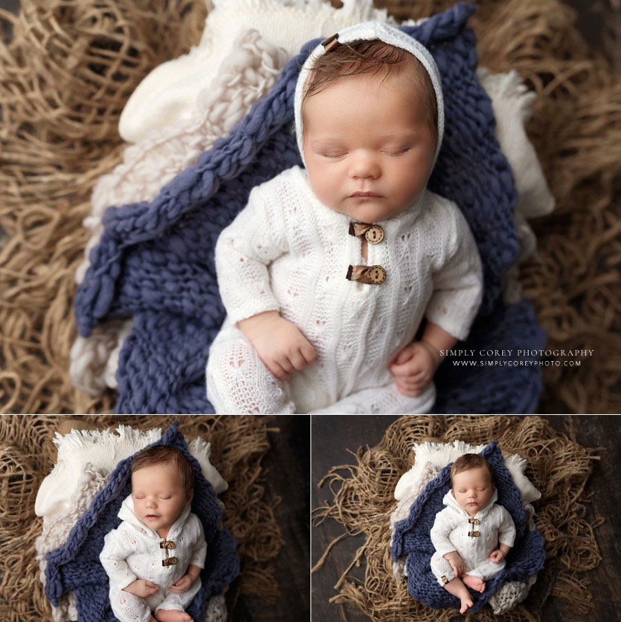 newborn photographer near Lithia Springs, baby boy in knit outfit with blue and brown studio set