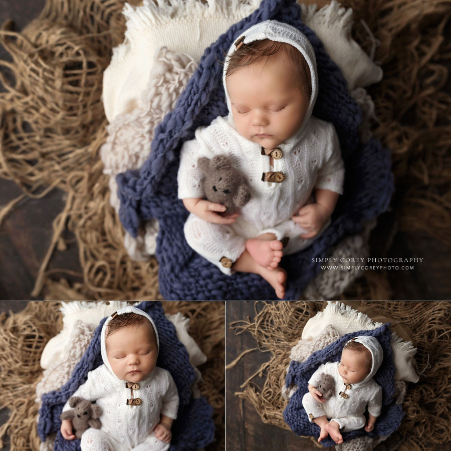 Powder Springs newborn photographer, baby boy in knit outfit with bear