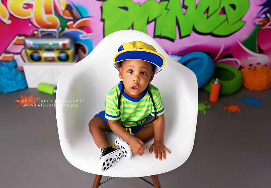 baby photographer in West Georgia, boy in chair for 90's fresh prince studio theme