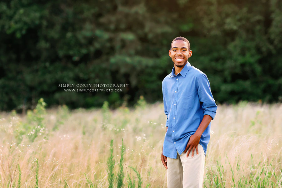 Carrollton senior portrait photographer in Georgia, outdoor session with teen boy in field