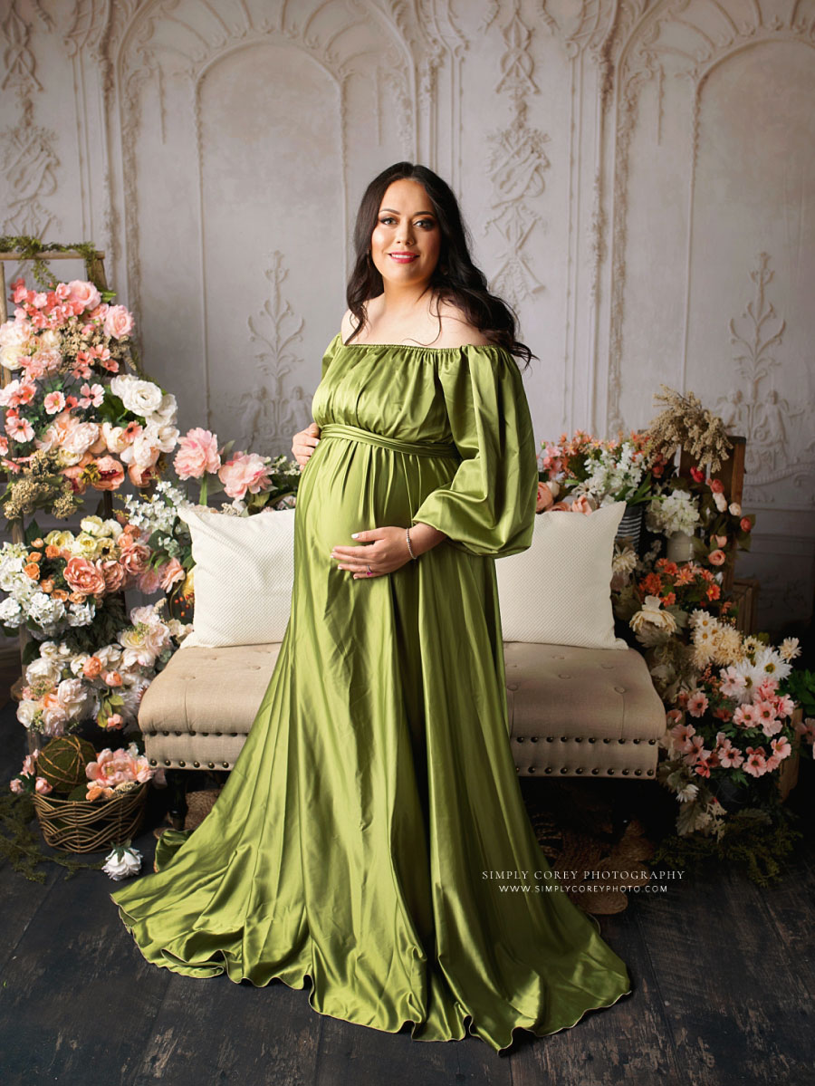 Carrollton maternity photographer in Georgia, pregnant mom in long green dress with flowers