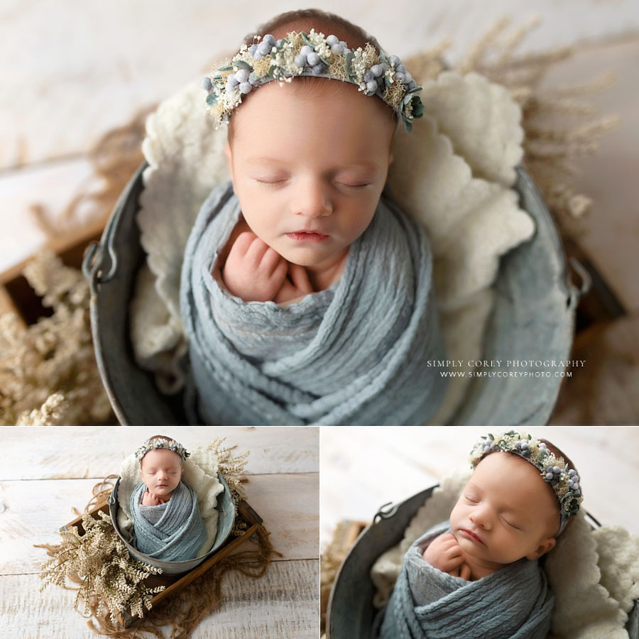 Villa Rica newborn photographer, baby girl with light studio set with blue wrap and flower crown