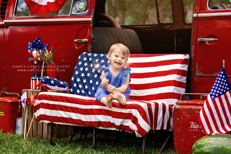 Atlanta mini session photographer, child with sparkler for VW bus 4th of July photo
