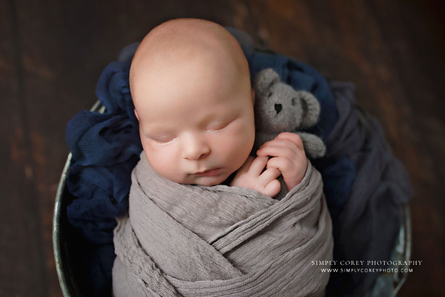 Carrollton newborn photographer in Georgia, baby boy in grey and blue with teddy bear