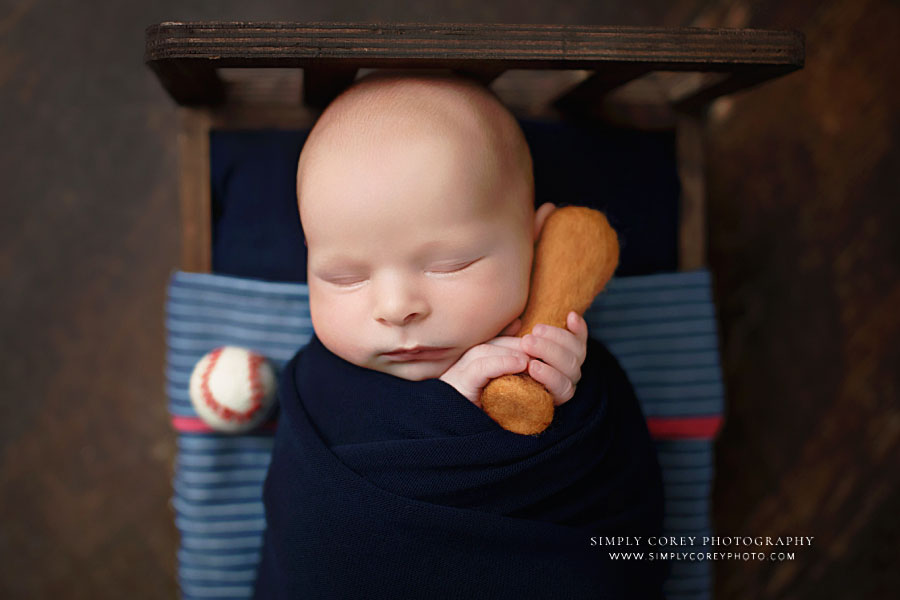 Newnan newborn photographer, baby boy with baseball and bat props