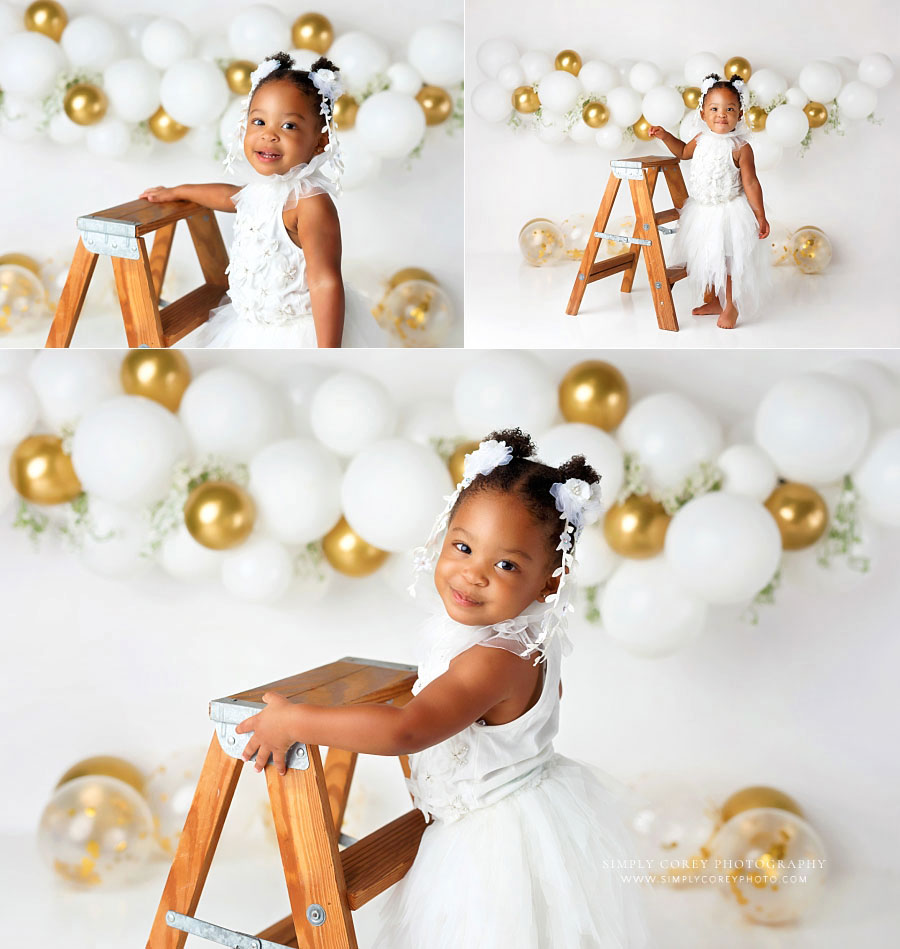 Newnan baby photographer, girl studio milestone session with white and gold balloons