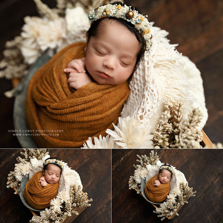 Newnan newborn photographer, baby girl in bucket with gold wrap and flower crown