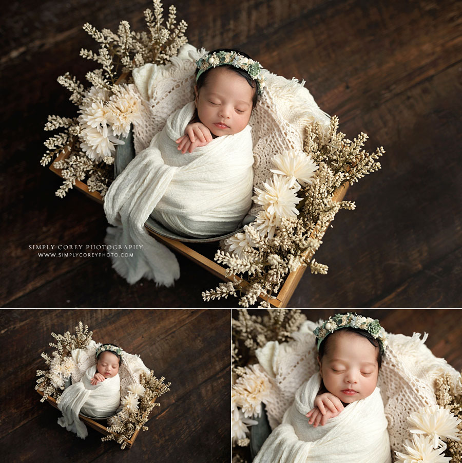 Newnan newborn photographer, baby girl cream colored studio set with flowers