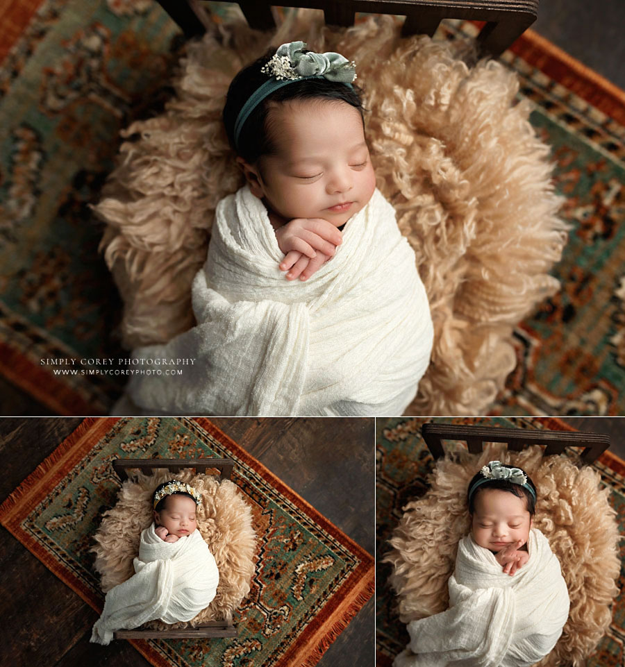 Villa Rica newborn photographer, baby girl in ivory wrap on colorful rug