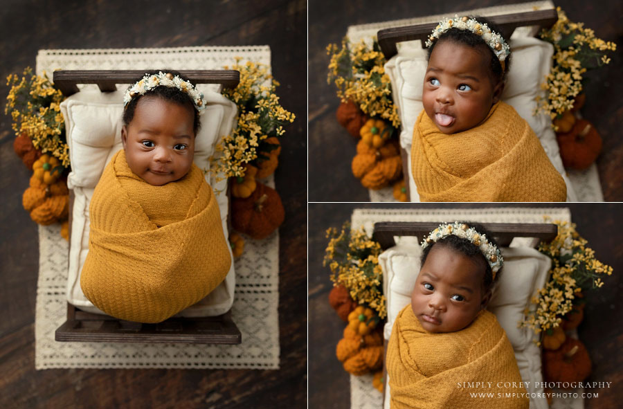 newborn photographer near Douglasville, older newborn in mustard wrap with fall studio set
