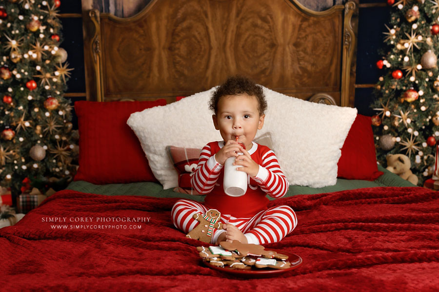 Douglasville mini session photographer, baby in Christmas pajamas with milk and cookies 