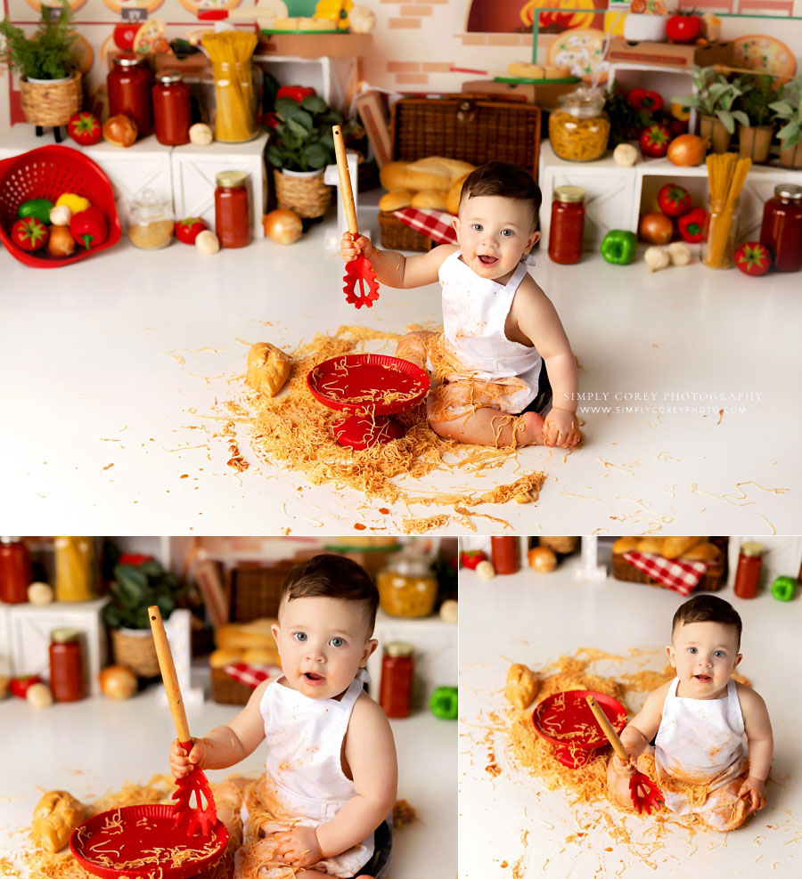 Bremen cake smash photographer, baby making mess with spaghetti on studio set