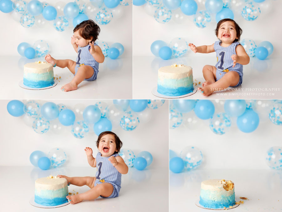 Bremen cake smash photographer, baby with toes in blue white cake on studio set