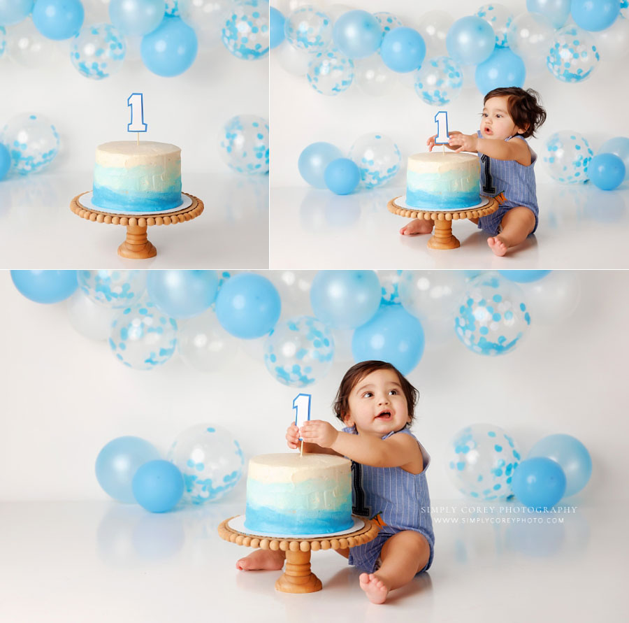 Newnan cake smash photographer, baby boy with blue and white balloons in studio