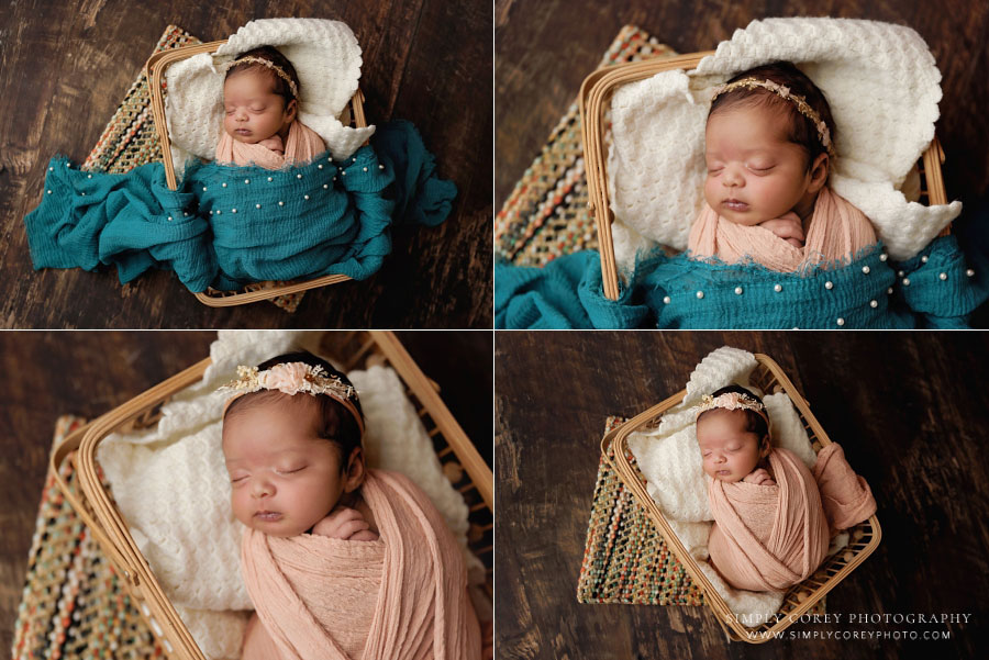 West Georgia newborn photographer, baby girl with pink and teal wraps in basket