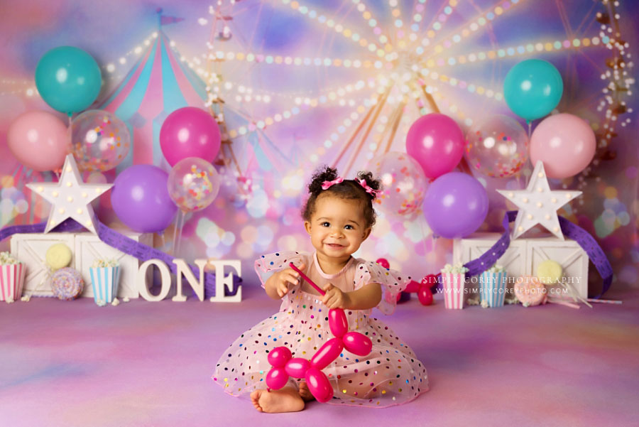 baby photographer near Atlanta, first birthday pink circus set with balloon animal