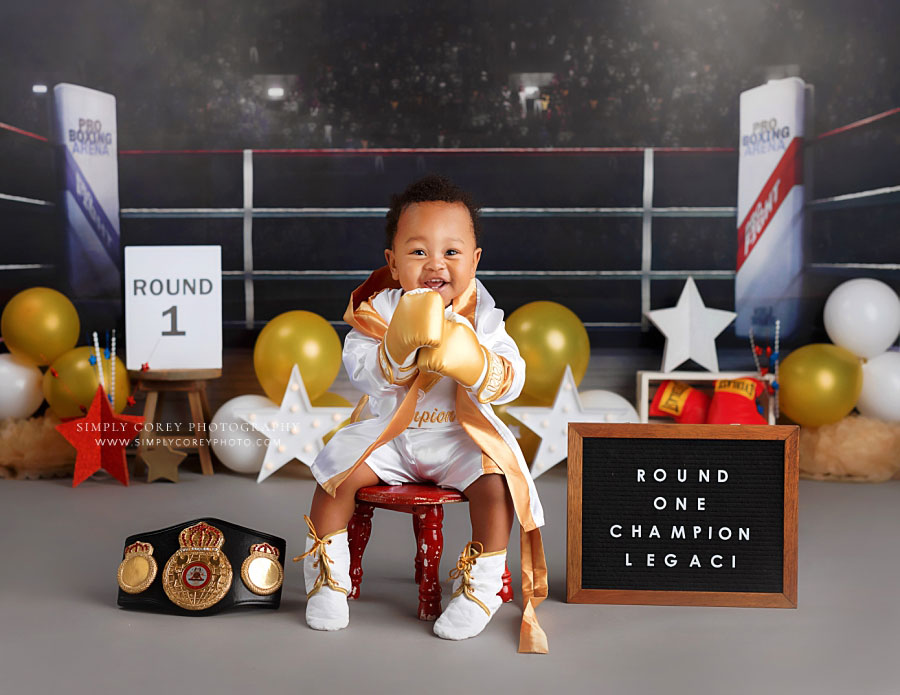 baby photographer near Newnan, boy in boxing robe and gloves for studio milestone session