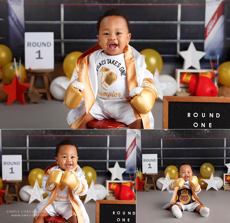 Villa Rica baby photographer, smiling boy in gold and white boxing robe and gloves