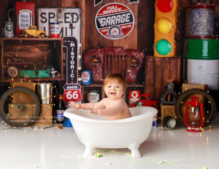 Atlanta baby photographer, boy in tub after garage cake smash