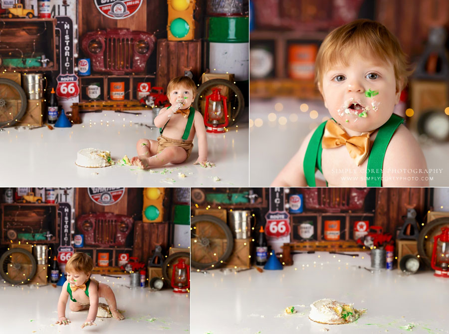 Carrollton cake smash photographer in GA, baby in suspenders on garage set