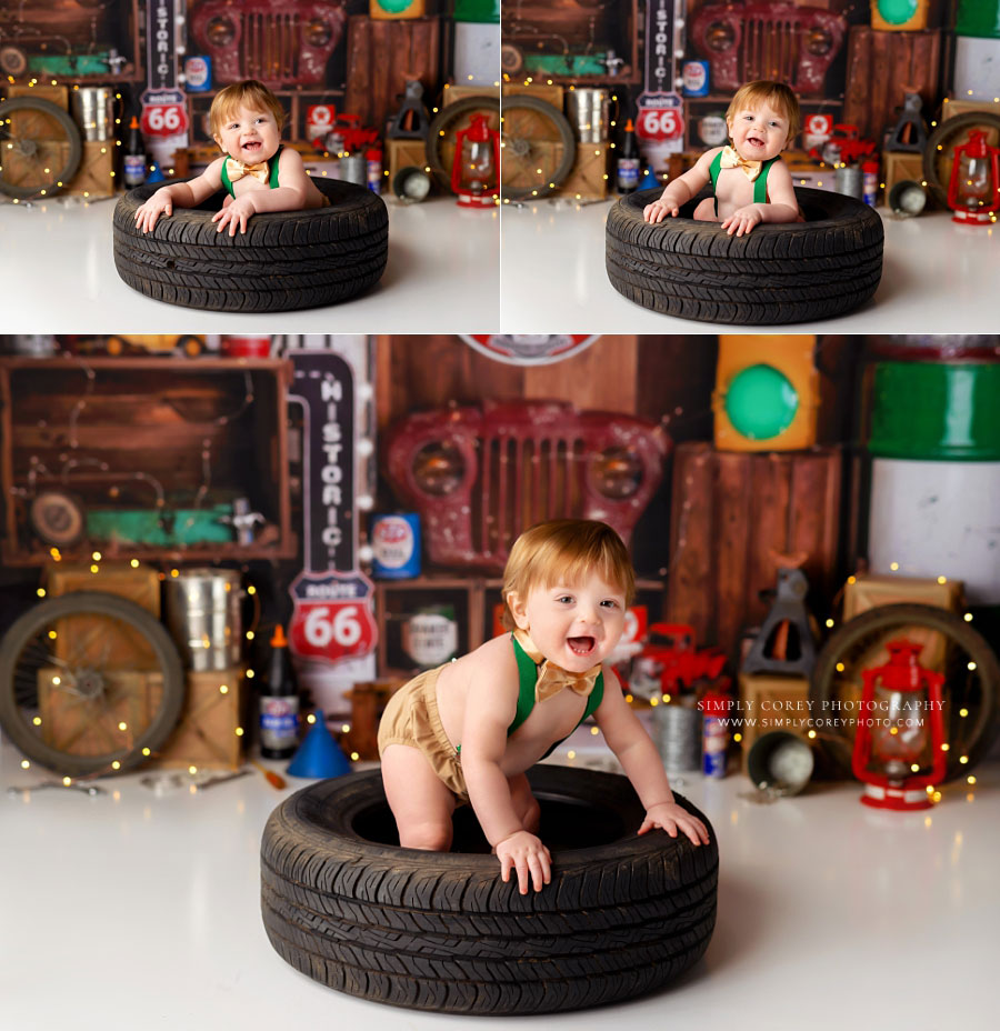 Newnan baby photographer, boy in tire for garage cake smash studio set