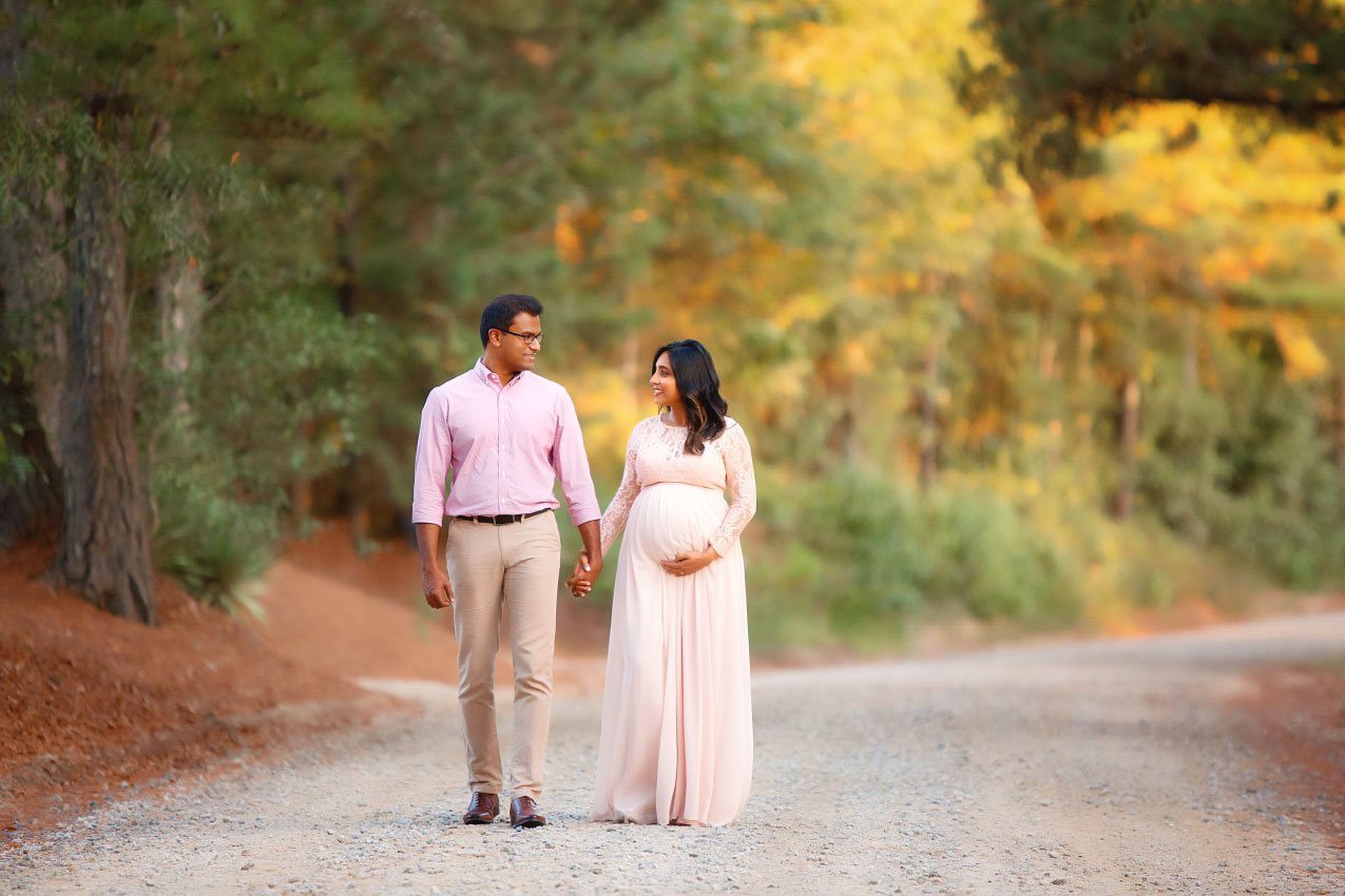 maternity photographer near Newnan, outdoor portrait of couple on country road